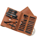 Brown leather case holding a 16 piece professional manicure and pedicure kit with black metal grooming tools