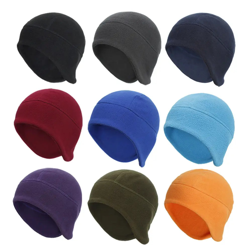 nine thermal fleece beanie hats in assorted solid colors including black gray navy blue red royal blue light blue purple olive green and orange designed for windproof winter sports headwear.