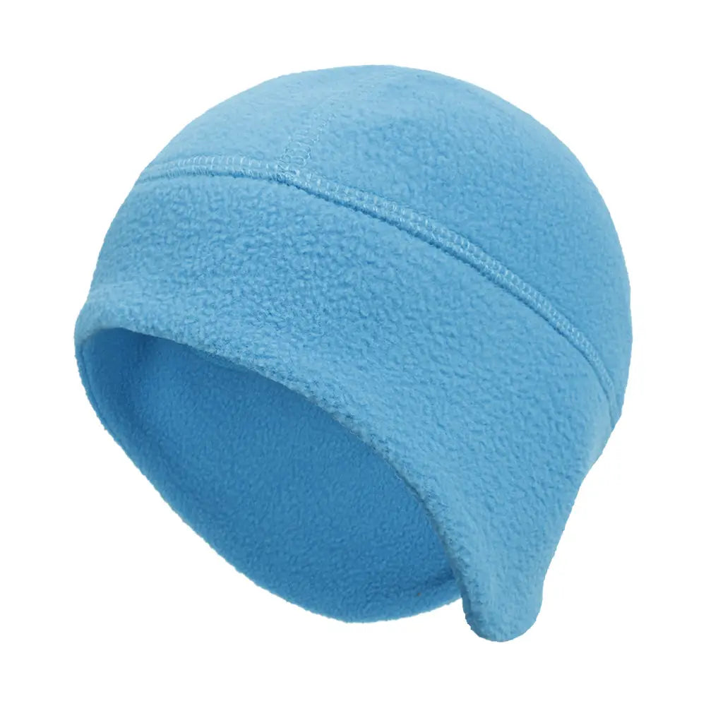 Light blue thermal fleece beanie hat with a soft textured surface and a subtle horizontal seam designed for windproof winter sports headwear.