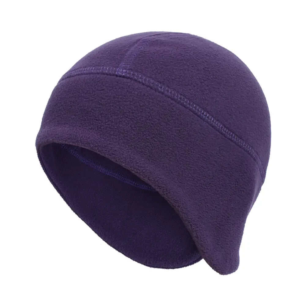 Purple thermal fleece beanie hat with a soft textured surface and subtle stitching along the top seam designed for windproof winter sports headwear.