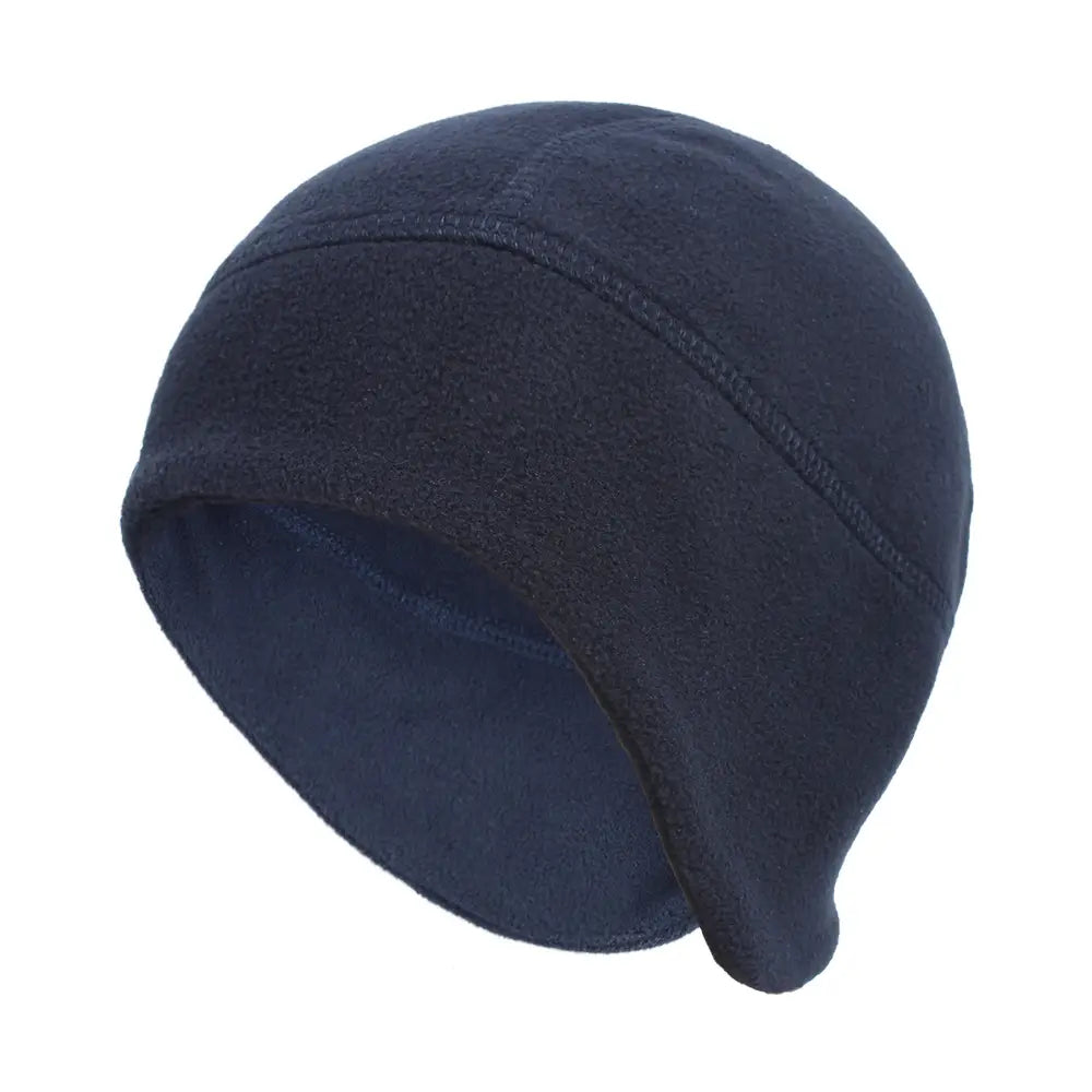 Dark navy thermal fleece beanie hat featuring a soft textured interior and subtle stitching along the seam designed for windproof winter sports headwear.