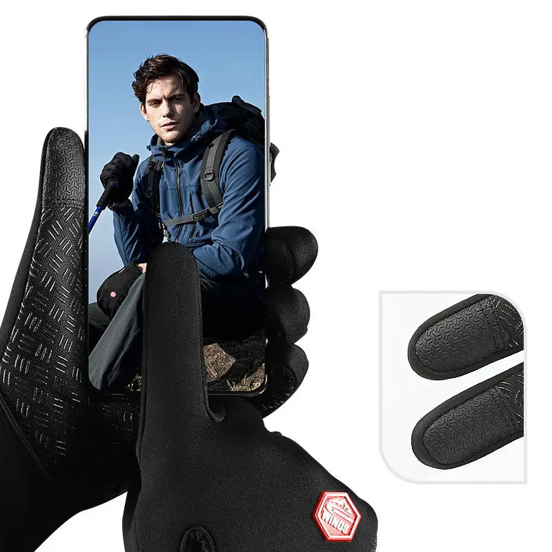 Black windproof touchscreen cycling gloves with textured fingertips and a red hexagonal logo on the wrist shown from the back side.