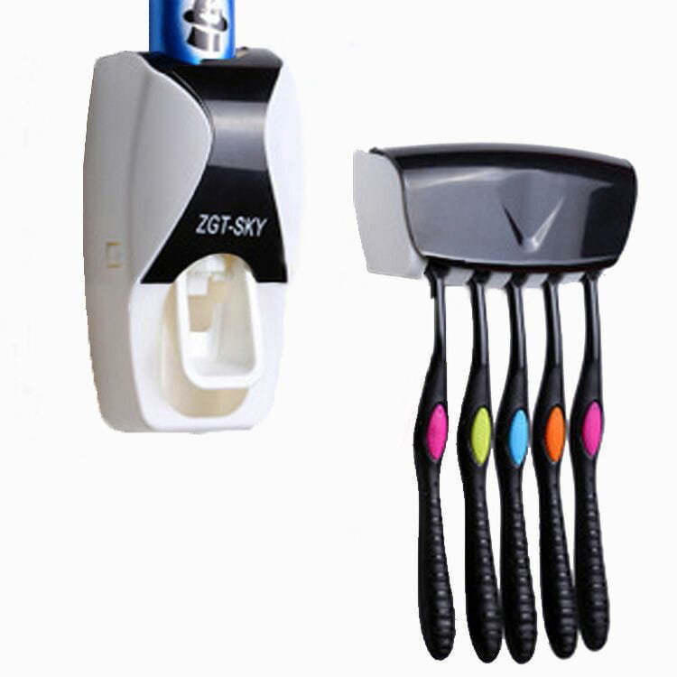 White and black ZGT-Sky automatic toothpaste dispenser and toothbrush holder set with a sleek modern design holding a blue tube of toothpaste.