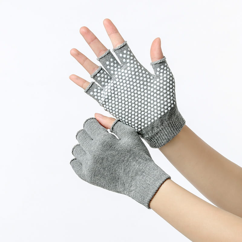 gray fingerless non-slip yoga gloves for women featuring a textured dotted grip pattern on the palm designed for fitness and weightlifting.