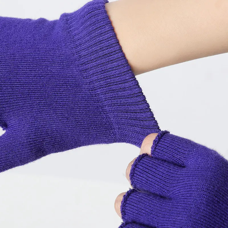 Purple knitted fingerless non-slip yoga gloves for women with ribbed cuff designed for fitness and weightlifting.