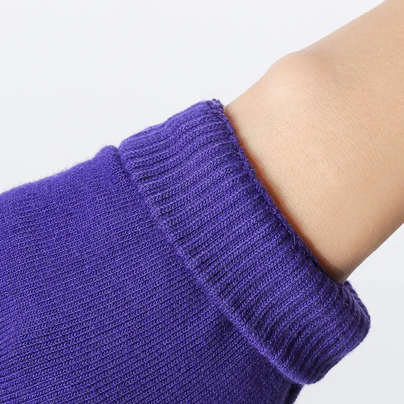 purple ribbed knit sleeve cuff of non-slip yoga gloves for women designed for fitness and weightlifting.