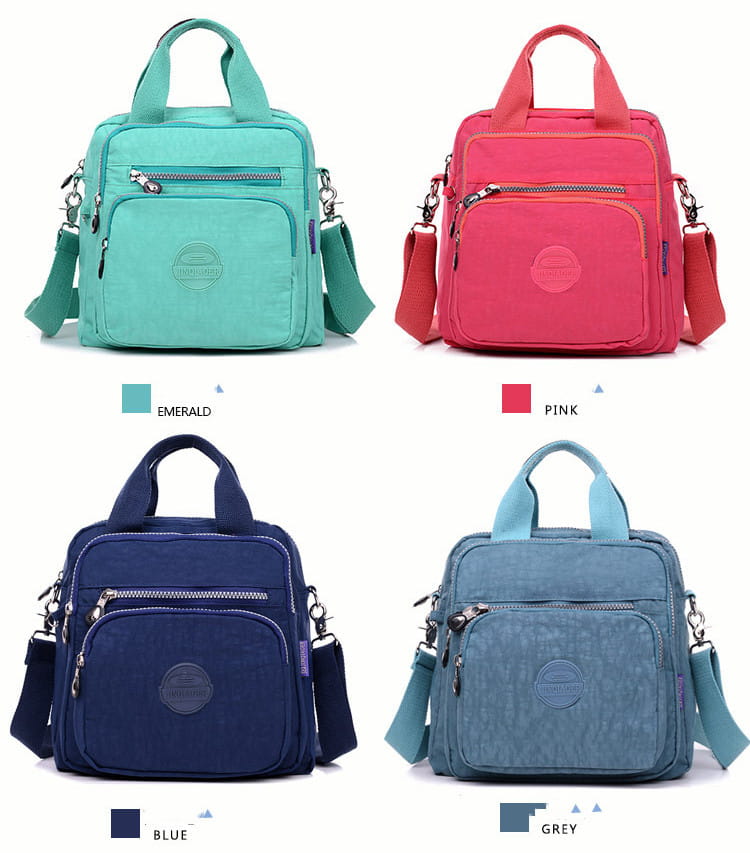 magenta multi-functional nylon crossbody bag 25cm featuring adjustable straps and multiple zippered pockets in emerald green pink navy blue and grey.