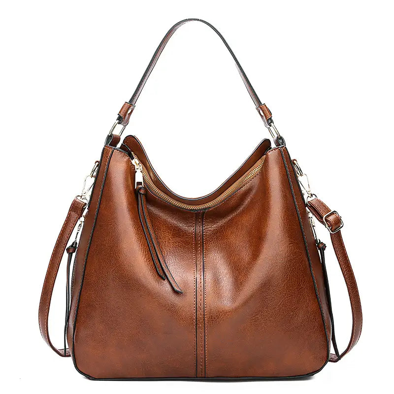 brown leather large capacity faux leather zippered hobo shoulder bag with single shoulder strap and detachable crossbody strap