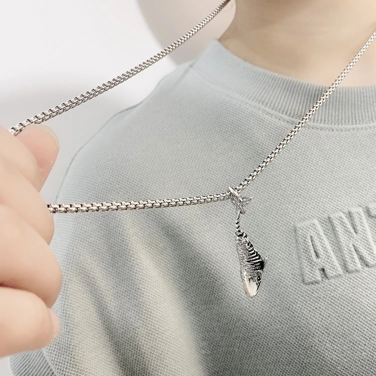 Silver shark pendant necklace with textured silver chain made of hip hop titanium steel.