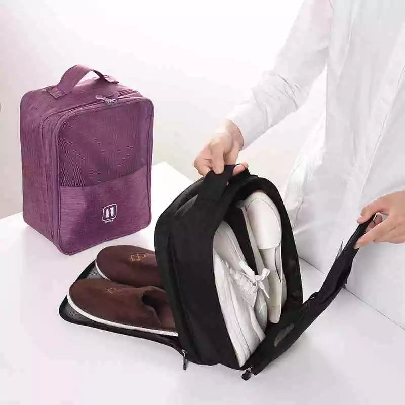 Housse de rangement pour chaussures en mesh violet, avec poignée robuste et fermeture éclair, conçue pour organiser les bagages de voyage portables.
