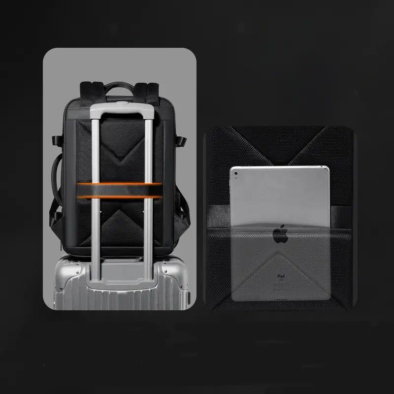 black textured business laptop backpack with silver handle and orange accent strap mounted on suitcase showing ipad in dedicated waterproof travel bag compartment
