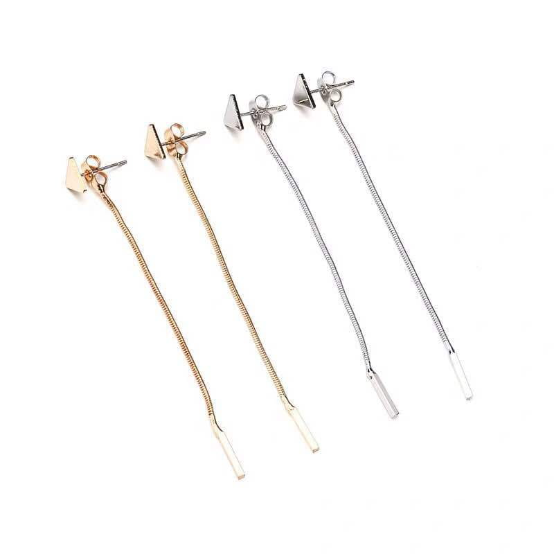 Set of four minimalist silver and gold triangle stud tassel dangle earrings with delicate chain drops.