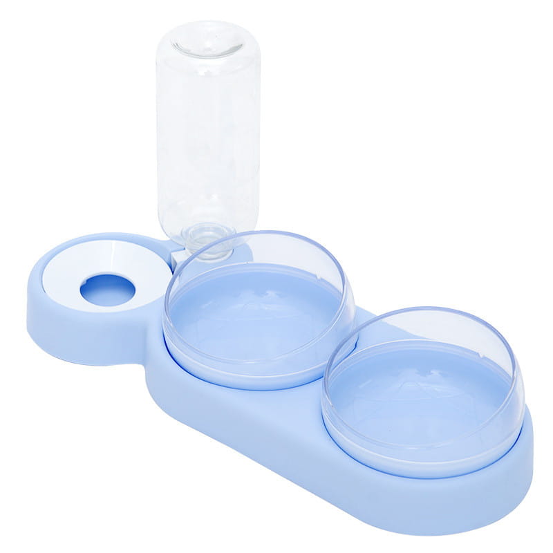 Hellblauer Kunststoff, automatischer Tierfutter- und Wasserspender mit zwei klaren Glasschalen und einer transparenten Wasserflasche oben.