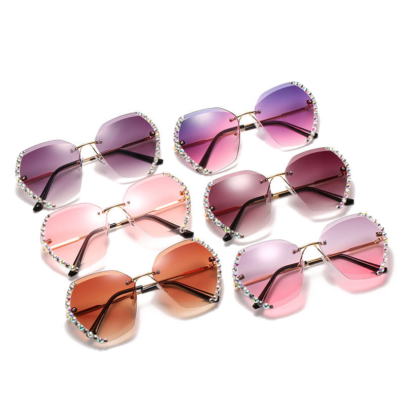 A set of six gold-tone metal frame cat-eye sunglasses with gradient-tinted lenses and rhinestone embellishments titled diamond studded rimless polygonal gradient sunglasses.