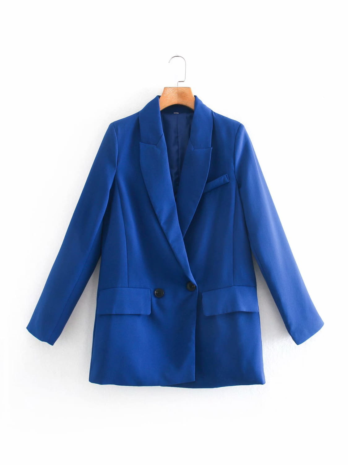 A vibrant royal blue women’s tailored double breasted longline blazer coat featuring black buttons and a sleek, fitted design.