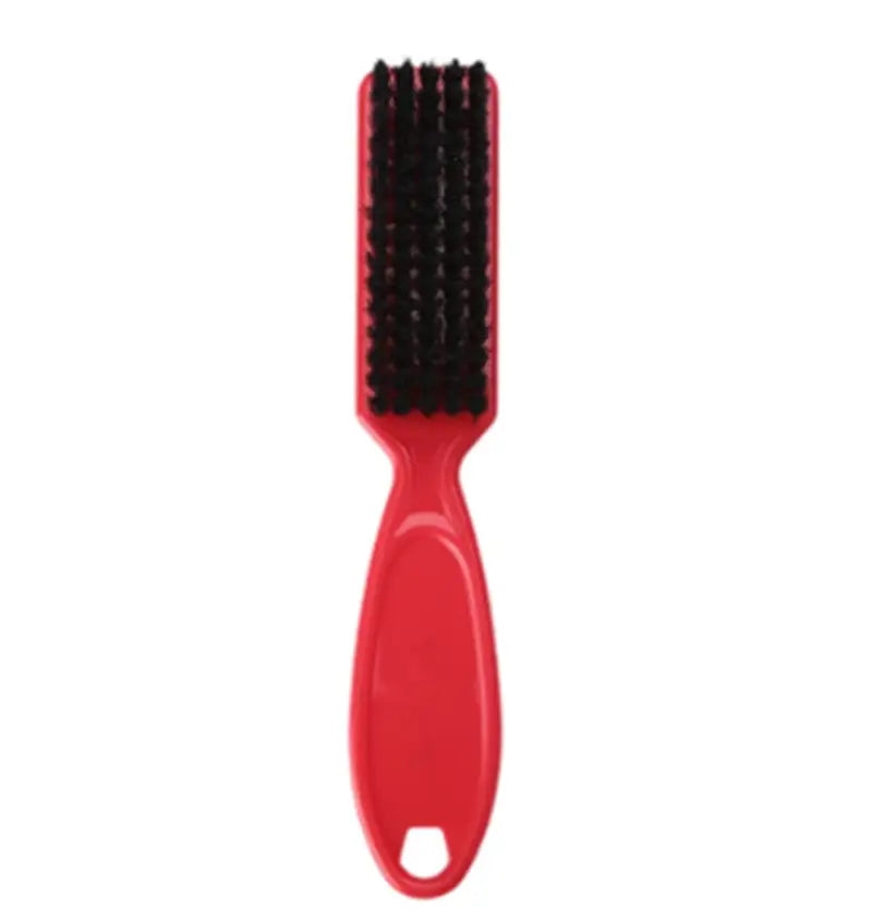 red plastic beard brush with dense black soft nylon bristles designed as a barber cleaning tool