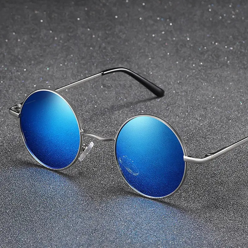 Retro round polarized metal sunglasses with uv400 protection feature round blue mirrored lenses, a sleek silver metal frame, and black temple tips.
