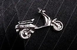 Silver scooter-shaped pendant with polished metallic finish and detailed design from the men’s airplane tie clip and lapel pin gift set.