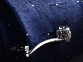 Silver pipe-shaped men’s airplane tie clip with a textured beaded design and polished metallic finish.