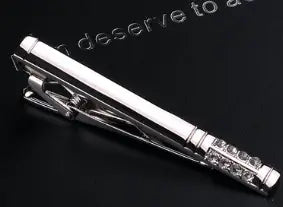 Silver tie bar with a sleek polished finish and ornate engraved design featured in the men’s airplane tie clip and lapel pin gift set.