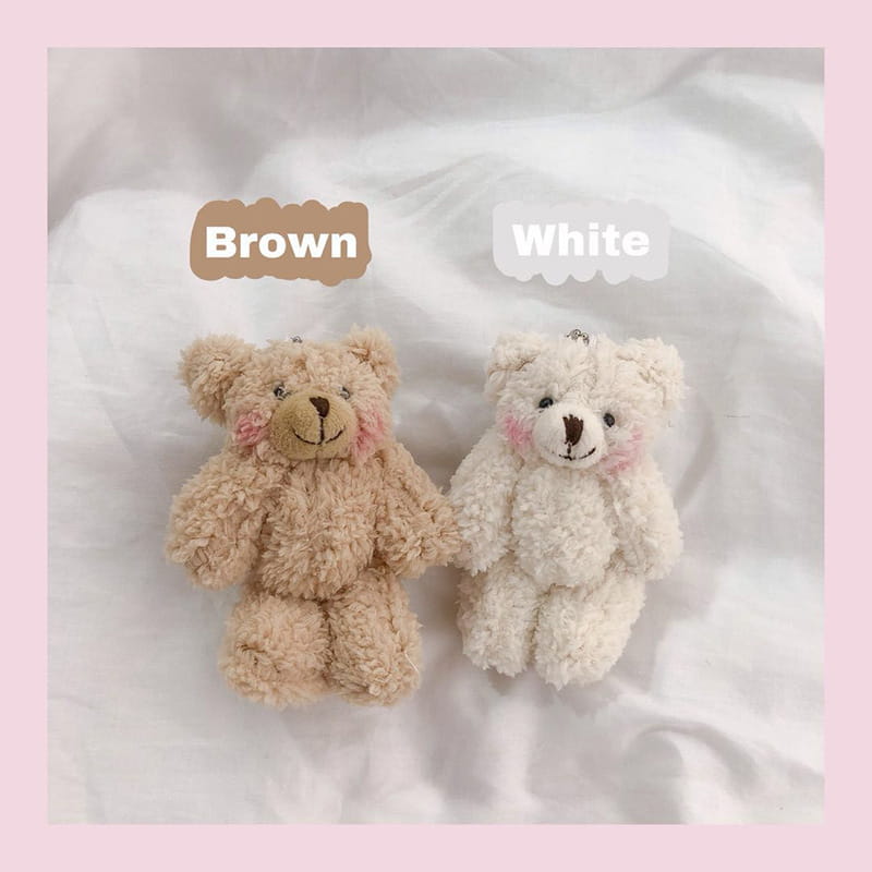 Plüsch-Teddybär-Schlüsselanhänger, niedliche Mini-Puppe-Anhängerfigur in Braun und Weiß mit weichem, strukturiertem Fell und rosig-roten Wangen.