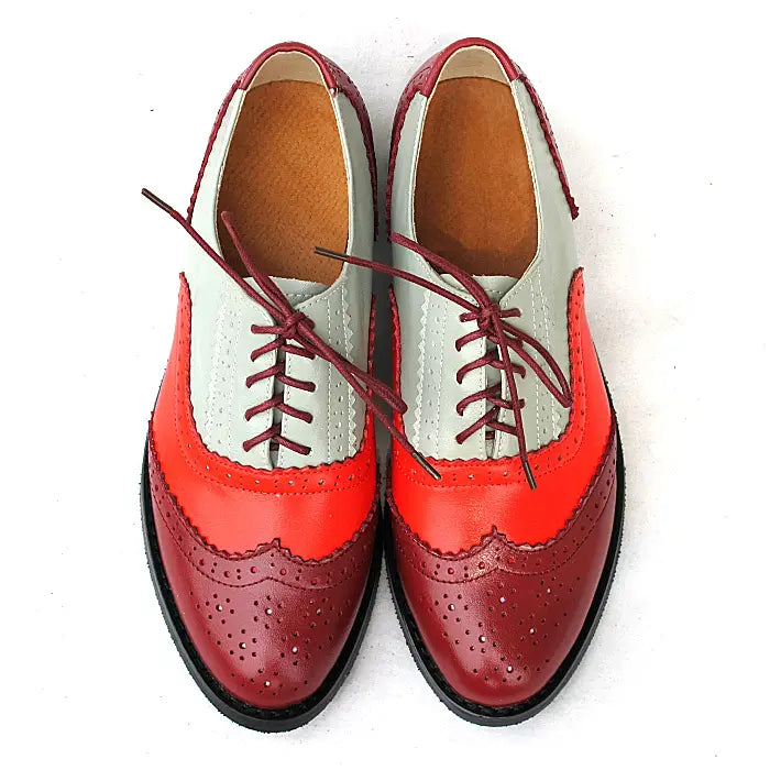 Leather oxford brogue shoes womens two tone flats featuring red and white two-tone leather with burgundy laces.