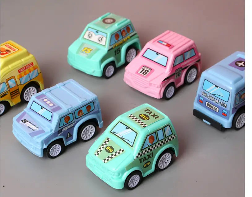 Pastel green plastic toy taxi with black and white checkered stripes and nyc lettering featuring a cartoon driver’s face from the pull back fire truck and engineering vehicle toy set.