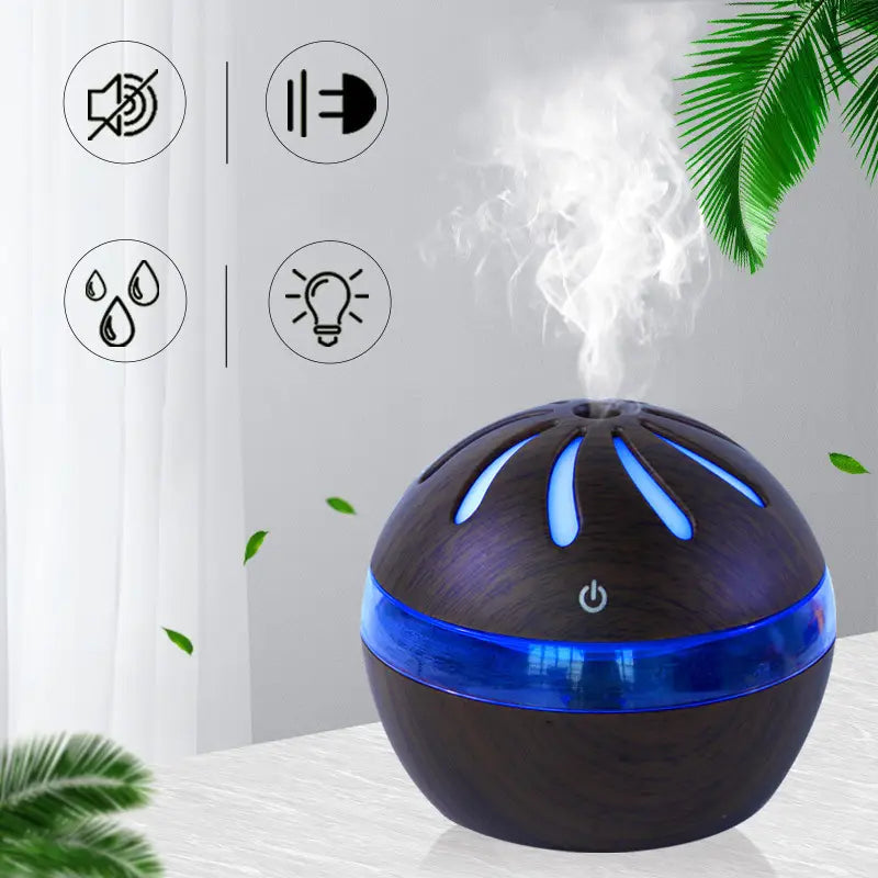 Black spherical Windmill wooden aroma diffuser with a glossy finish and blue LED lighting emitting mist from its top, USB powered with 1-liter capacity.