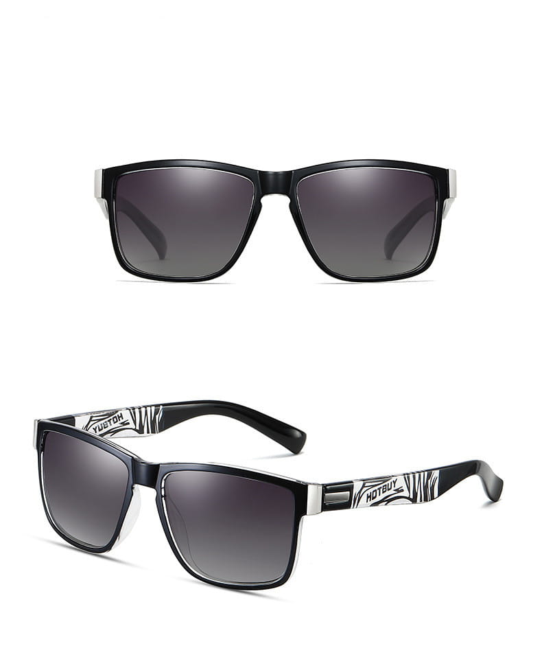 polarized square sports sunglasses with uv400 protection featuring black and white zebra-striped frames and gradient gray lenses.