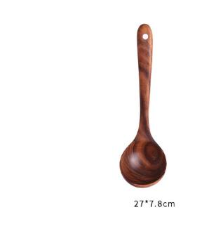 A polished teak wood kitchen spoon with a smooth rounded bowl and a slender handle featuring a small hole at the top from a 7 piece cooking utensil set.