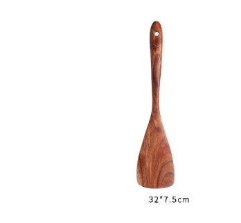 Wooden spatula with a smooth natural finish and visible grain patterns from the teak wood kitchen utensil set cooking spoons 7pcs.