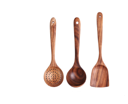 Set of three teak wood kitchen utensils including a slotted spoon, ladle, and spatula with natural wood grain for cooking.