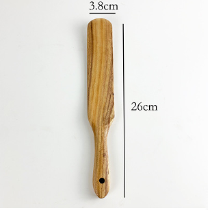 A slender 26cm long wooden spatula with a natural light brown finish and visible grain patterns from the teak wood kitchen utensil set cooking spoons 7pcs.
