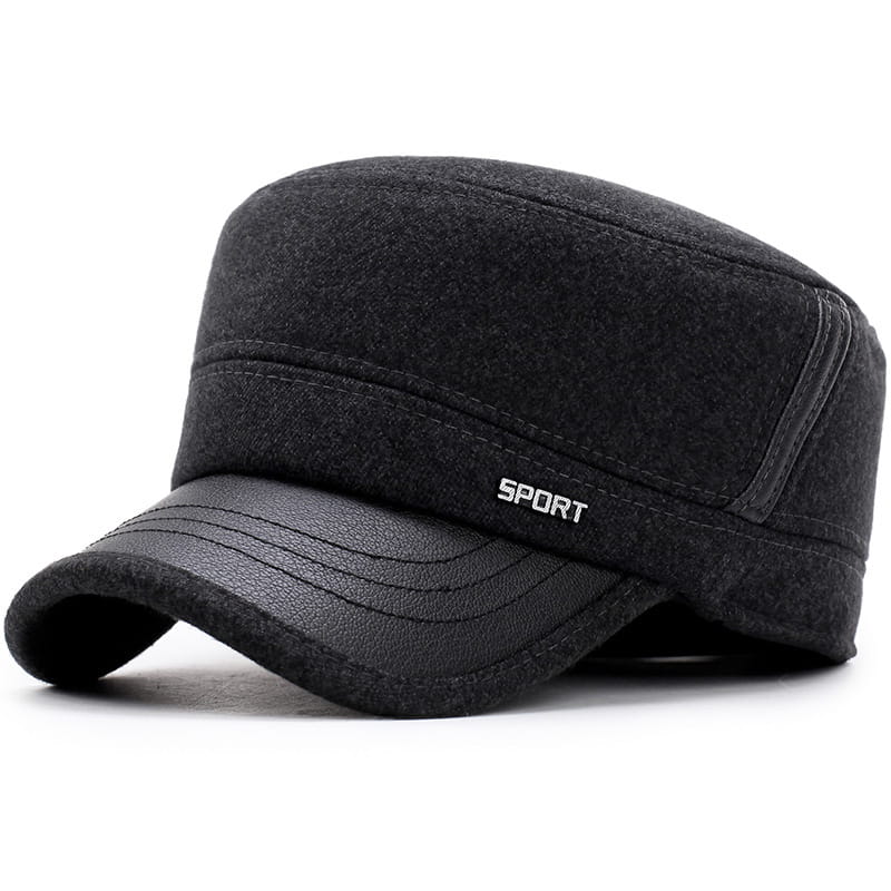 Black wool flat cap with leather trim and sport embroidered in white on the side designed as a winter hat for men