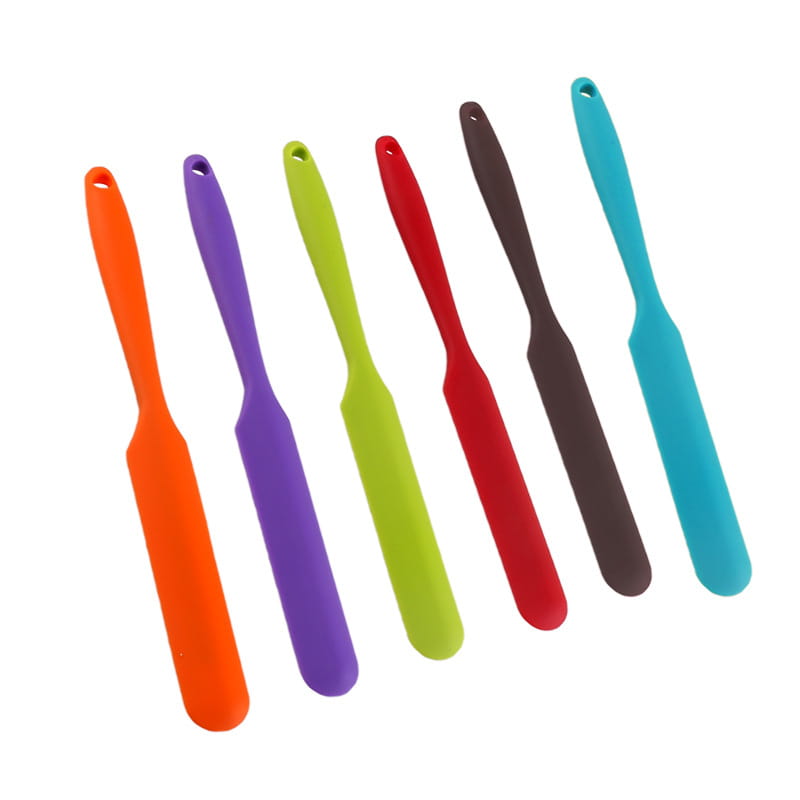 Set of six colorful silicone baking spatulas in vibrant orange purple green red brown and teal heat resistant for kitchen use.