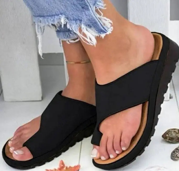Black platform women flat slide sandals with a thick sole and adjustable strap design in plus size 43 shown from the back side