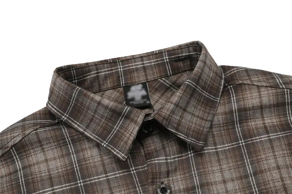 brown and white plaid button-up shirt with a classic collar and embroidered details designed as a short sleeve casual shirt