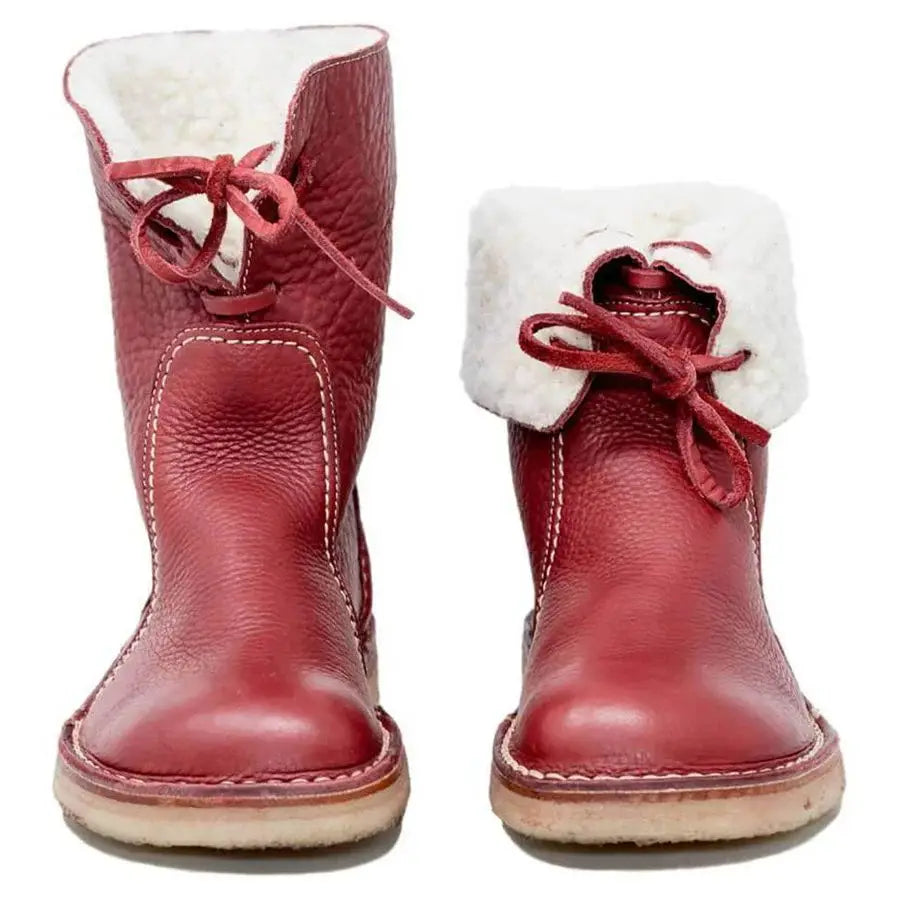 women’s shearling lined leather martin boots in red featuring white shearling lining and matching red laces