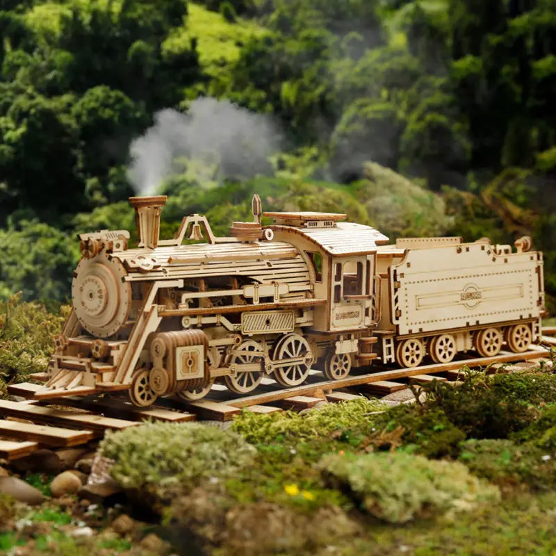 A detailed wooden steam locomotive model with intricate gears and wheels crafted from light-colored wood in a 3d wooden train puzzle diy mechanical model kit.