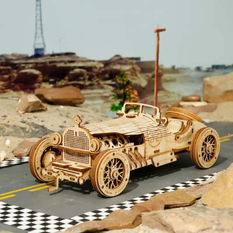 A meticulously crafted 3d wooden train puzzle diy mechanical model kit of a vintage racing car featuring intricate cut-out details and natural light brown wood grain.