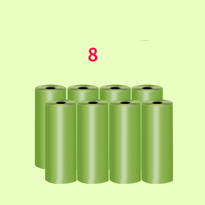 eight rolls of green plastic dog poop waste bags included in a dog poop bag dispenser and waste bags set