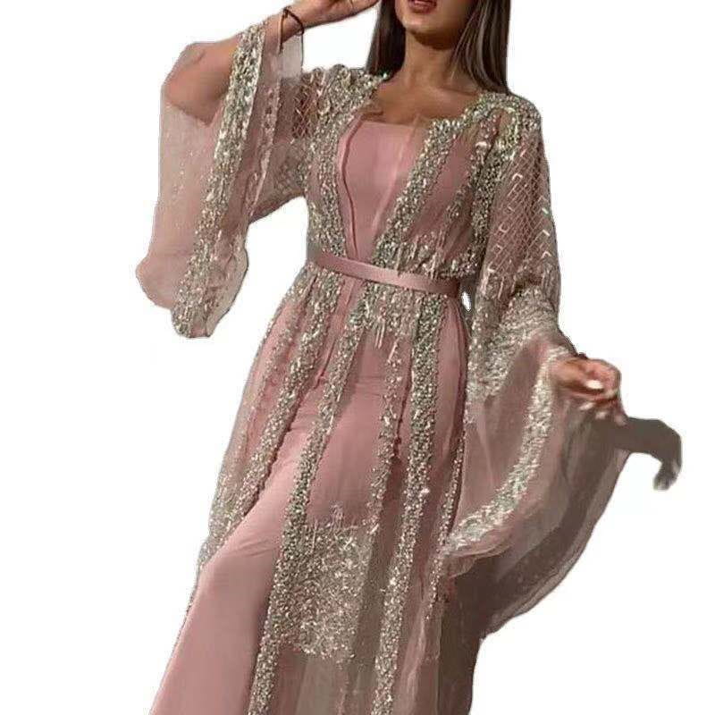 A flowing pink embellished lace v neck Chinese retro evening gown with a sheer overlay featuring intricate silver beading and lace detailing.