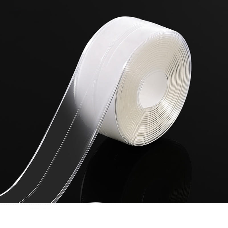 Ruban adhésif d’étanchéité transparent clair en PVC, anti-moisissure pour cuisine, enroulé en un rouleau soigné, pour des applications de bande d’étanchéité imperméable.
