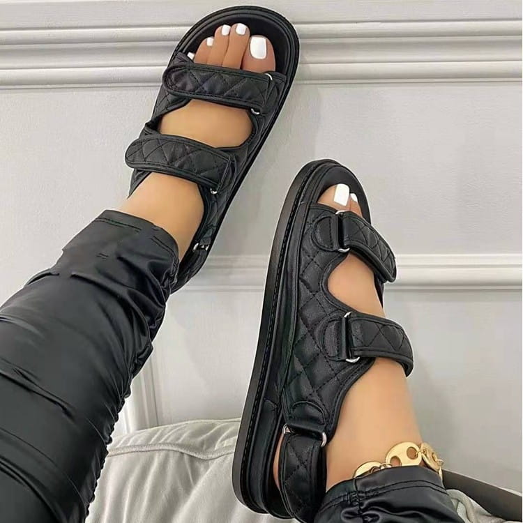 black quilted women velcro platform beach sandals with two adjustable straps and a thick sole