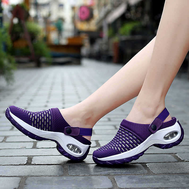 Purple mesh air cushion clog sandals with white soles featuring breathable material and height increasing design.