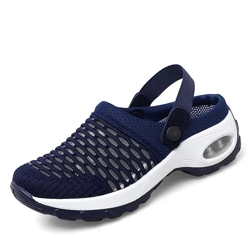 Navy blue mesh air cushion clog sandal with breathable material, adjustable strap, and white height increasing sole.