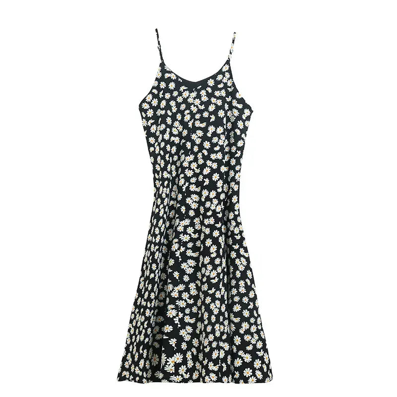 floral print halter midi dress for women featuring a black spaghetti strap design adorned with a delicate white daisy print.