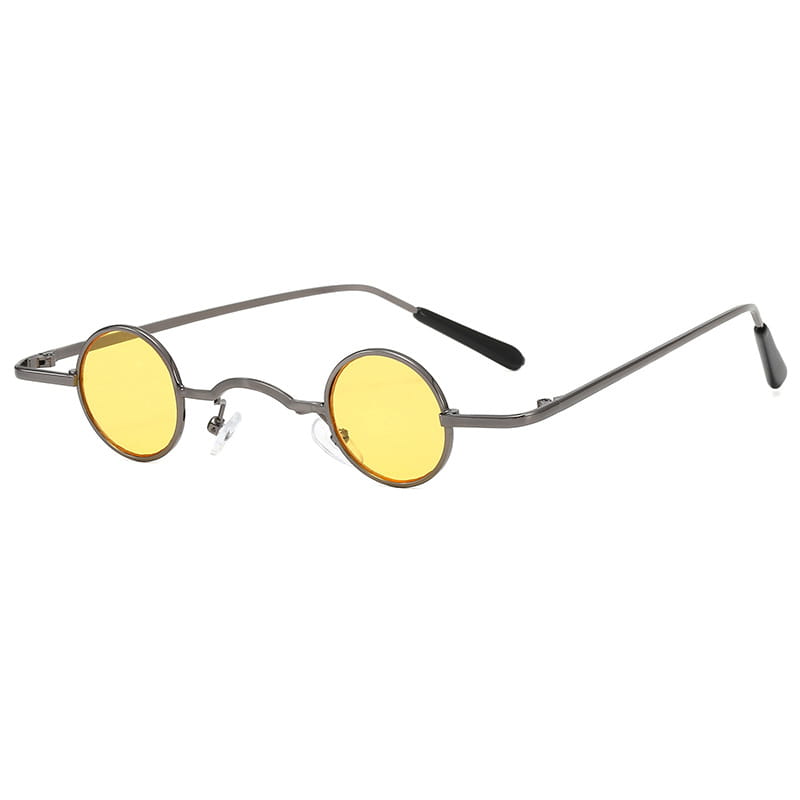 Retro round metal hip hop sunglasses featuring round-framed vibrant yellow lenses with a sleek metallic frame.