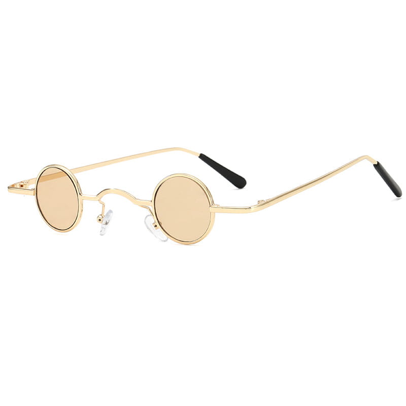 Retro round metal hip hop sunglasses featuring gold-toned round frames with amber-tinted lenses and black temple tips.