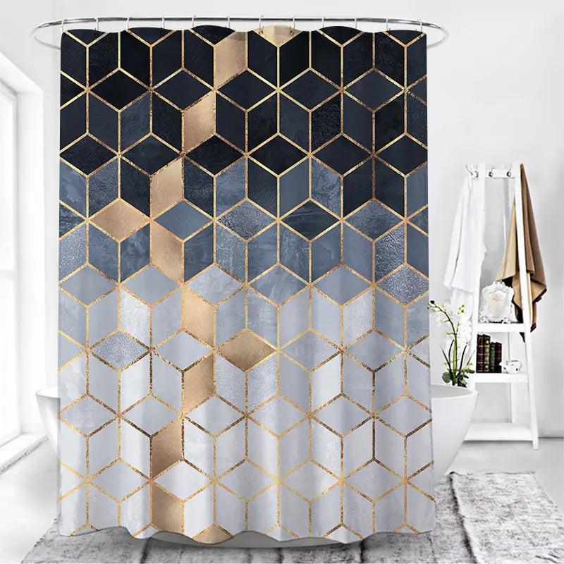 A modern geometric navy and gold shower curtain with a gradient pattern of navy blue white and gold hexagons outlined in metallic gold.